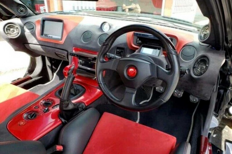 На eBay продают Mazda RX-7 с обвесом от RE Amemiya и фарами от Nissan 370Z