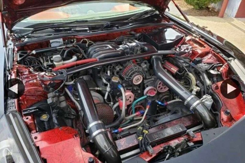 На eBay продают Mazda RX-7 с обвесом от RE Amemiya и фарами от Nissan 370Z