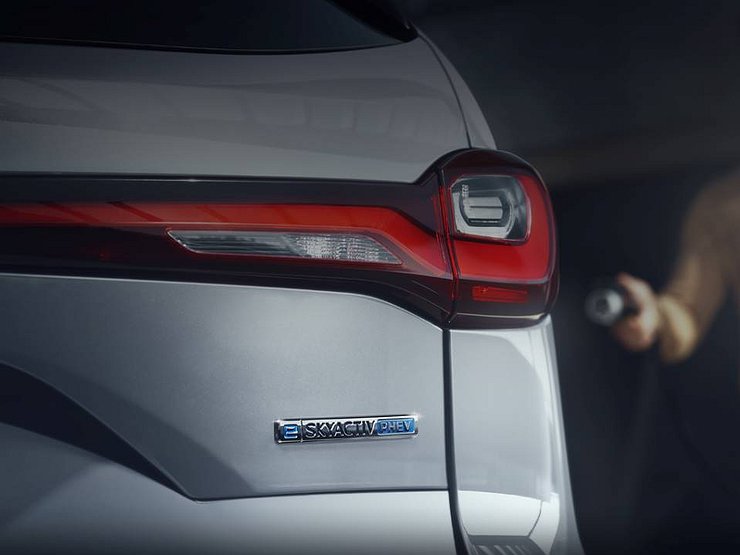 Mazda показала изображение гибридной версии своего новейшего кроссовера CX−90 1 Mazda показала изображение гибридной версии своего новейшего кроссовера CX−90
